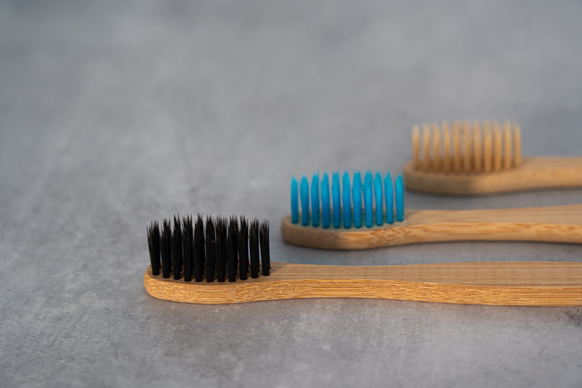close up photo of wooden toothbrush